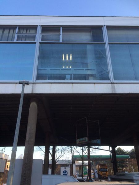 Are there any scaffolding companies that could give us a approx cost for erecting us a scaffold to the bottom of the broken window (see photo)Job at moto services m1 j25-26: Swipe To View More Images